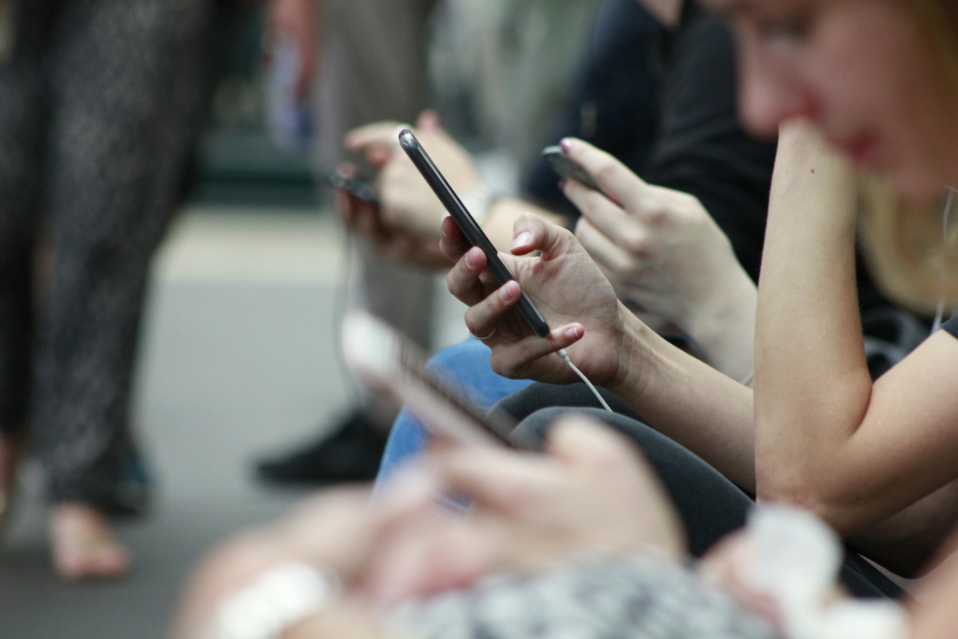 People scrolling on their phones
