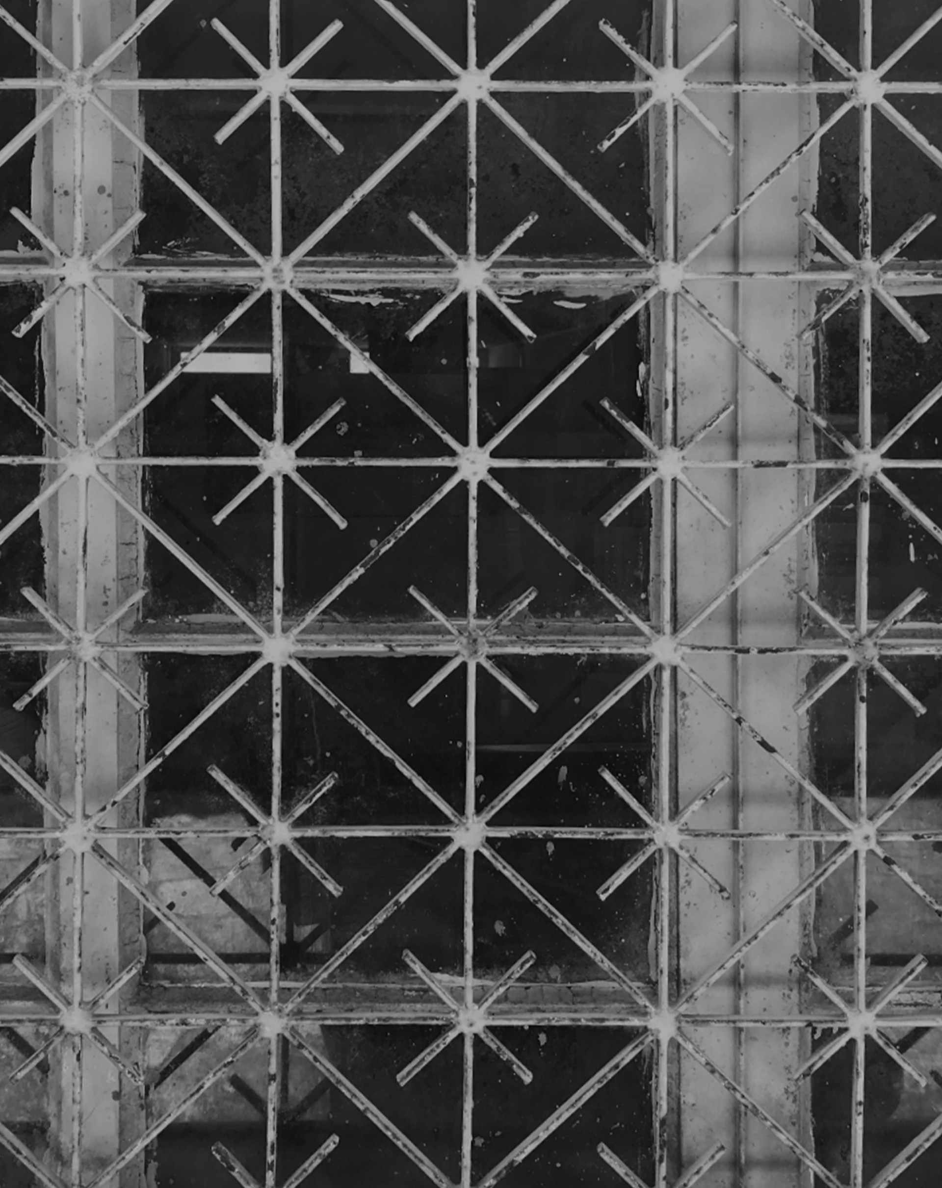 The pixel typeface pattern on a window