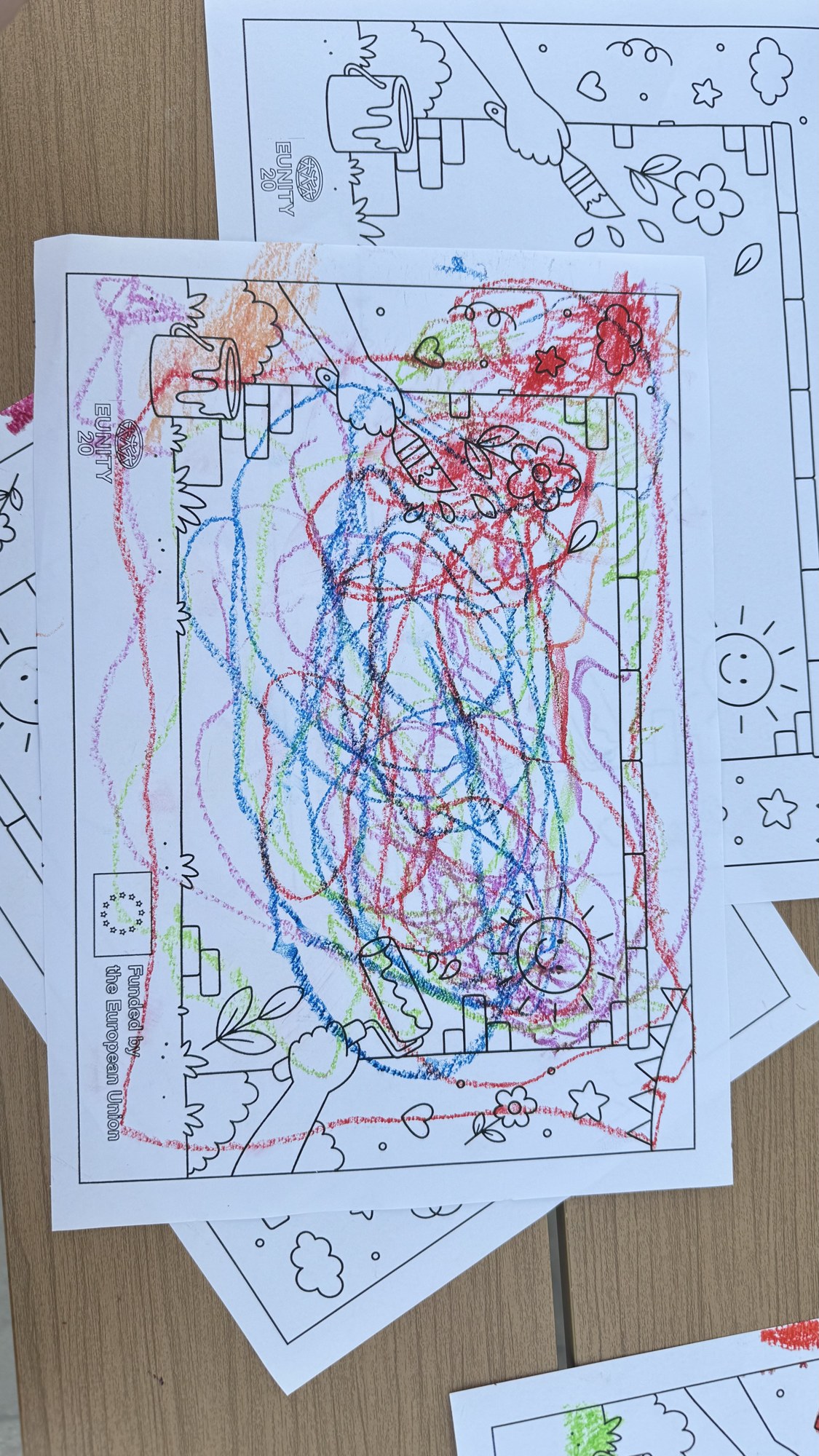 A colouring sheet covered in scribbles