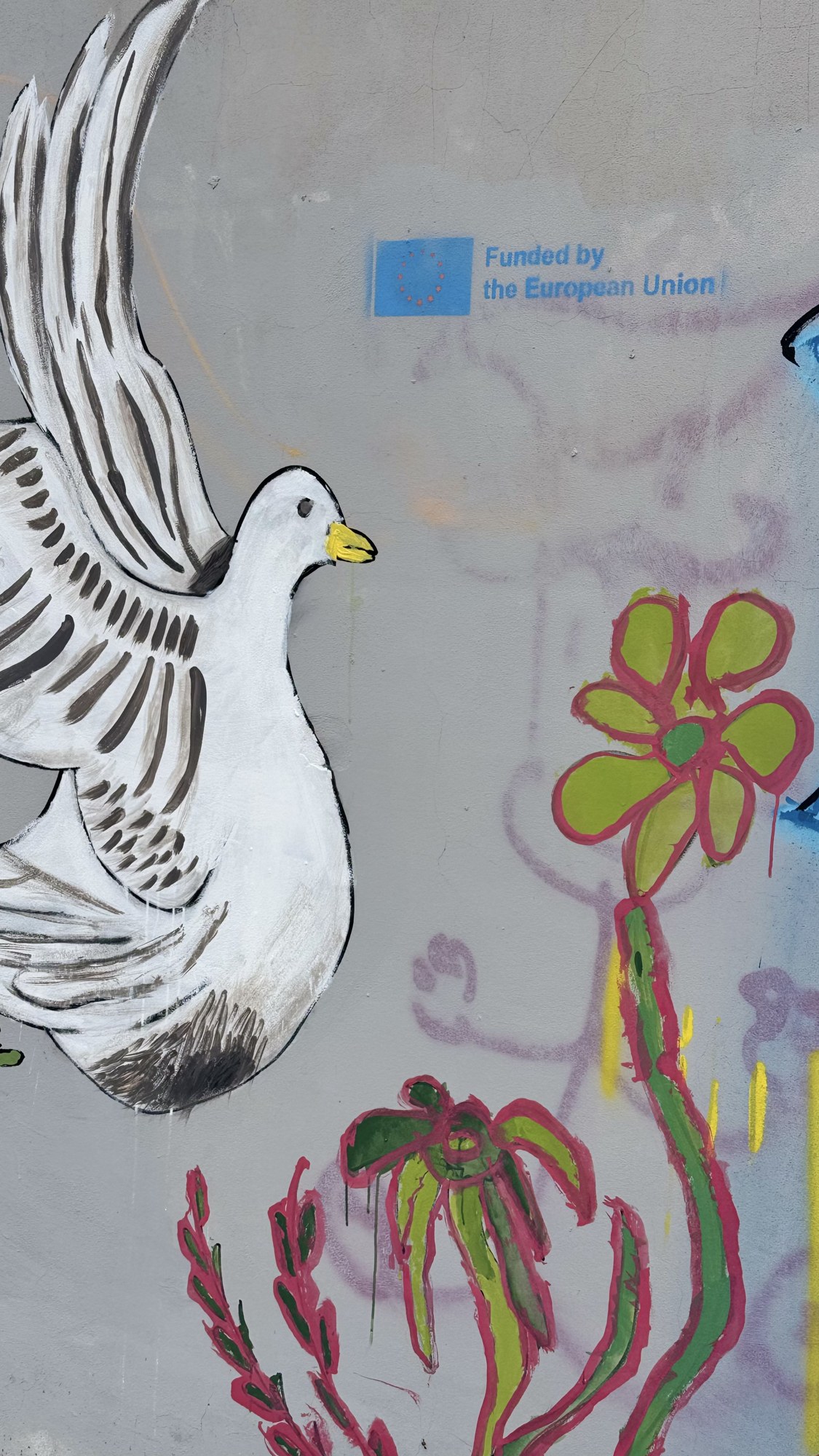 The dove beside the EU stencil