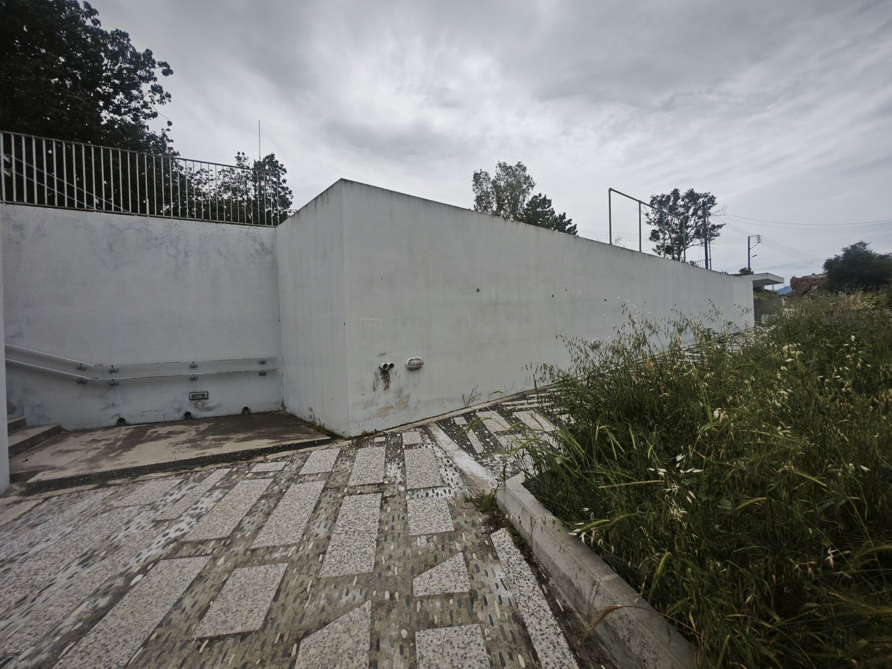 The bare wall at the Malounta Community Amphitheatre