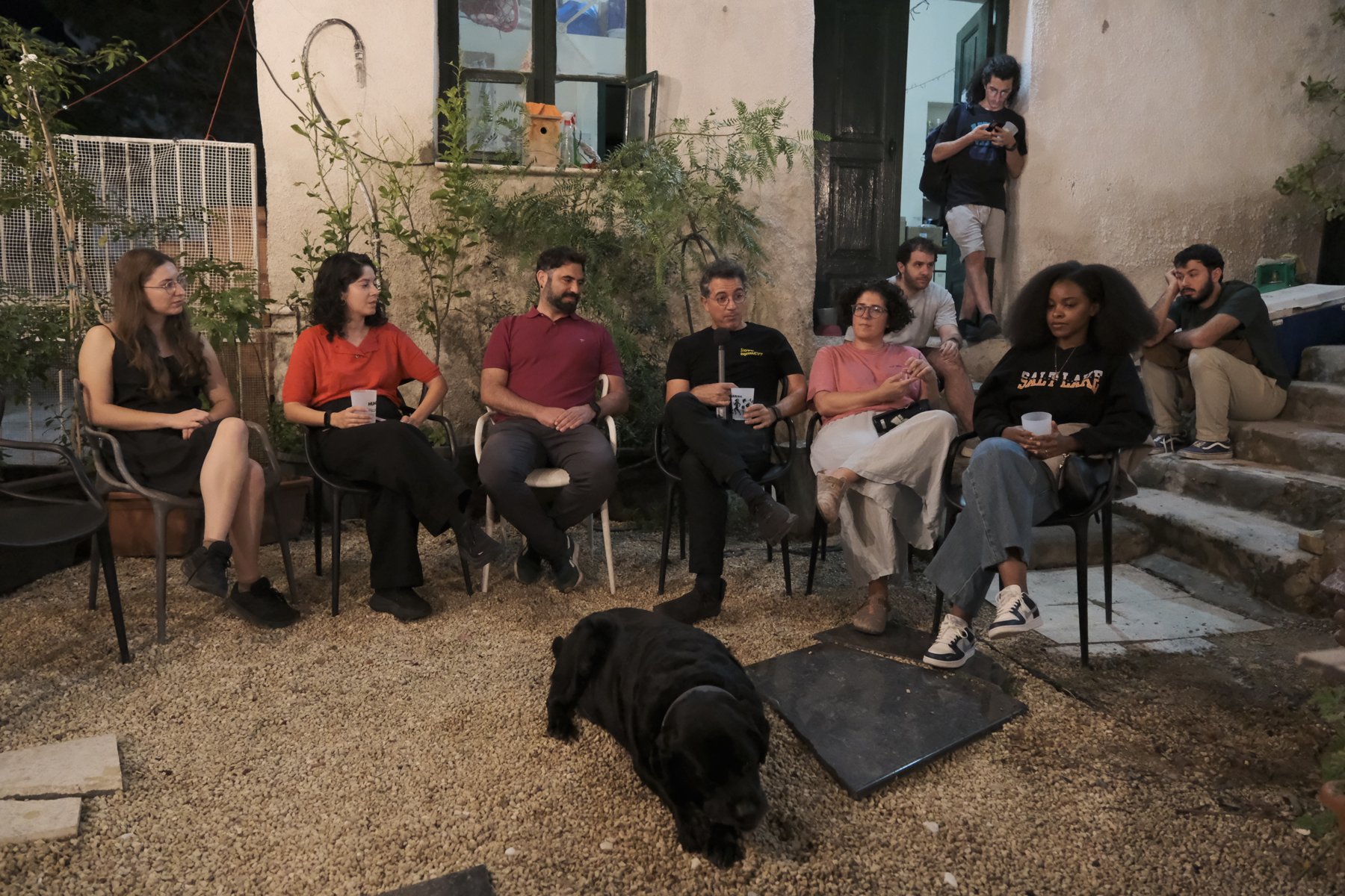 The conversation in OPU House's courtyard
